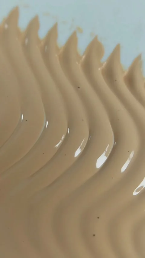 The art of smoothing cream in a zig-zag pattern. Close up of a beauty product Stock Footage 329644017