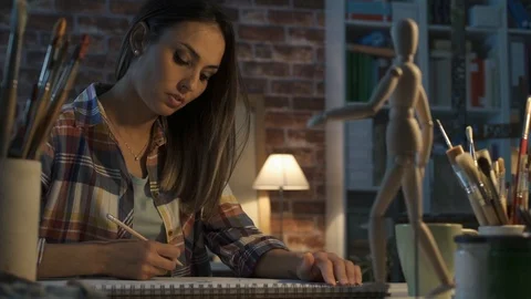 Art student working in the studio Stock Footage 90371472