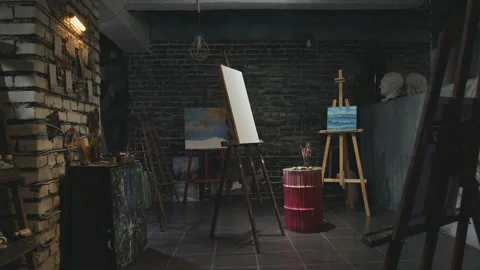 An art studio with a blank canvas in the middle Video stock 149041896