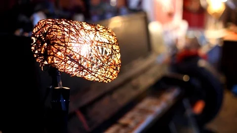 Art studio focus pull, lamp to old upright piano Stock-Footage 109184420