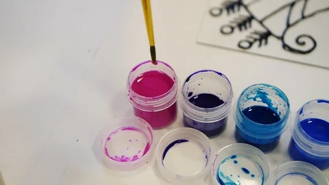 Art studio paint brushes and ink paintings Stock-Footage 103286035