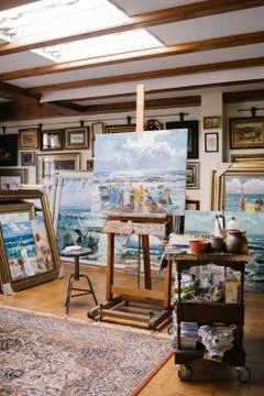 Art studio with paintings and tools Stock Photos
