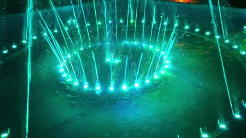 Artesian fountain with various colored lights in Romania. 4K video Stock Footage 317429901