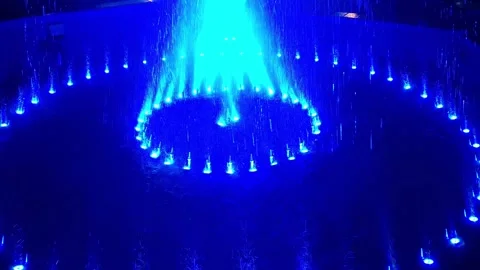 Artesian fountain with various colored lights in Romania. 4K video Stock Footage 317429904
