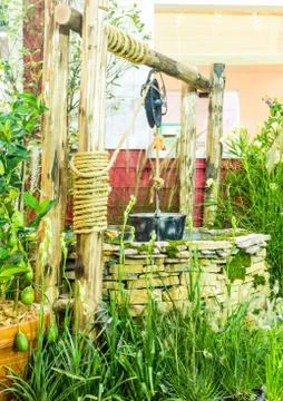 Artesian well and bucket. Foto stock