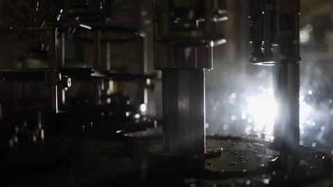 Artful backlit slo mo: Machinery in wine bottling plant comes to stop Stock Footage 305732986