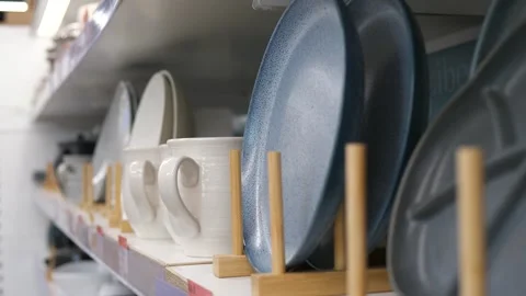 Artfully arranged dinnerware collection in trending blue-and-white color scheme Stock Footage 314707476
