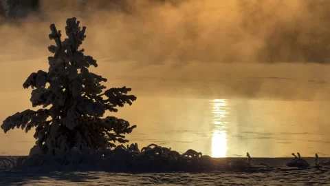 Artic circle Finland winter light mist rising on flowing river epic location Stock Footage 330910294
