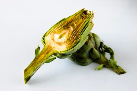 Artichoke cutted white background Stock Photos