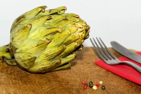 Artichoke on a table Stock Photos