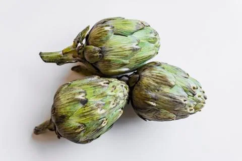 Artichokes isolated on white background Stock Photos