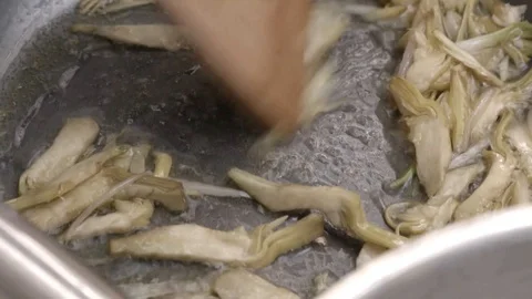 Artichokes in the pan Stock Footage 93730940
