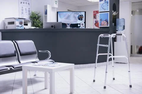 Articles for people with walking problems in clinic reception hallway 스톡 사진