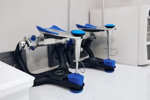 Articulators to test human jaws plaster casts in clinic Stock Photos