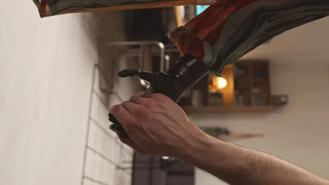 Artificial and Human Hands Intertwining Stock Footage 244909124