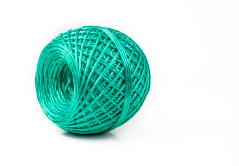 Artificial ball of nylon string for household on white. Stock Photos