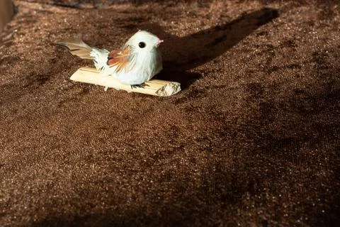 Artificial bird made out of colored handicrafts elements Stock Photos