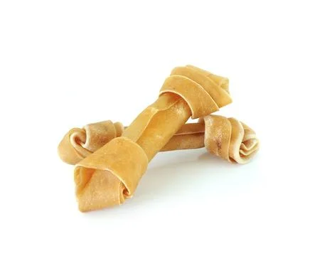 Artificial a bone for a dog with vitamins Stock Photos
