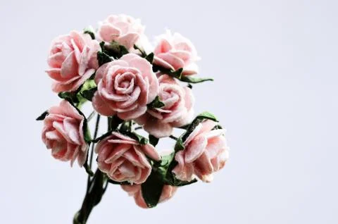Artificial bouquet on a gray background Stock Photos