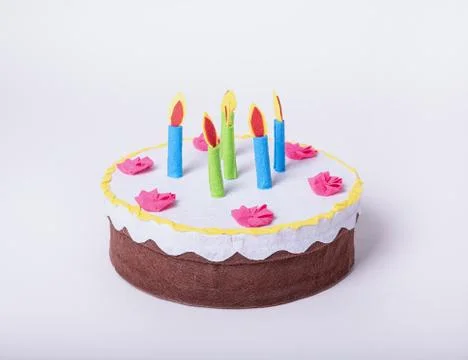 Artificial cake on a white isolated background. Stock Photos