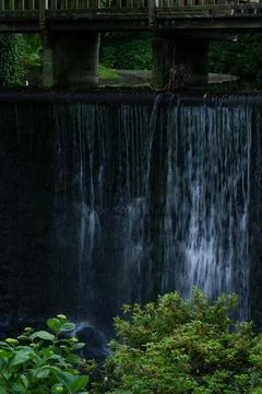 Artificial cascade waterfall  Stock Photos