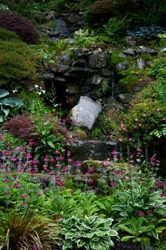 Artificial cascade waterfall  Stock Photos