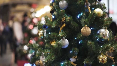 Artificial christmas green tree decorated with white and yellow christmas balls 스톡 동영상 105068897