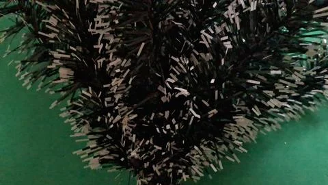 Artificial christmas tree branches with dark green and silver needles Stock Photos