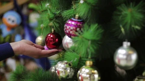 Artificial Christmas tree decorated with different toys. Stock Footage 83031712
