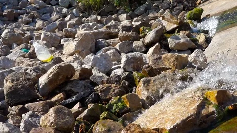 Artificial Concrete Water Stream Source and Litter Nearby Stock Footage 102520440