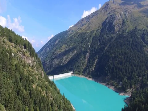Artificial dam - Wall dam and mountains Stock Footage 70806122