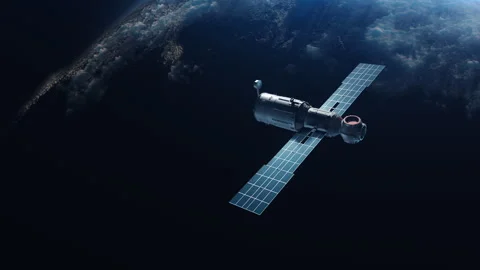 Artificial Earth satellite orbiting the planet flies away in the space of spa Stock Footage 240534842