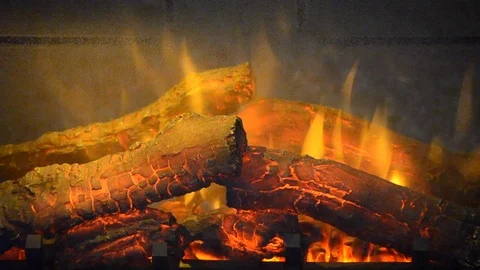 Artificial electrofireplace glowing backlight close-up. Stock Footage 105399256
