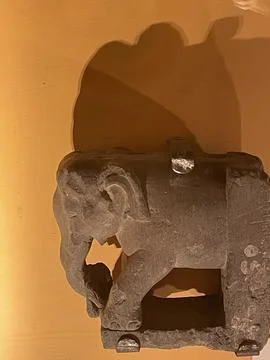 An artificial elephant made of stone. Stock Photos