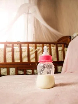 Artificial feeding, milk expression, isolated on a white background Foto stock