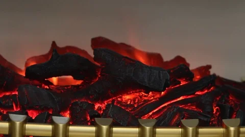 Artificial fire burns in the fireplace Stock Footage 99833991