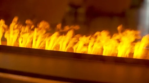 Artificial fire burns stripe in a restaurant 動画素材 127057332