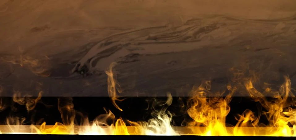 Artificial fire in the fireplace, close up Stock Photos