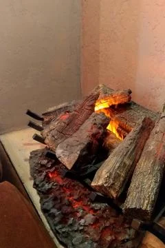 Artificial fireplace with artificial flame, a place of rest Stock Photos
