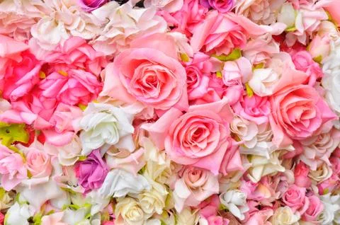 Artificial flowers background Stock Photos