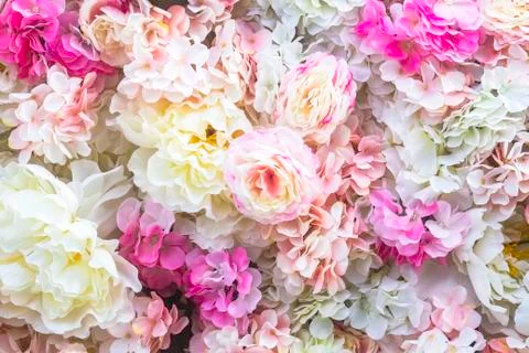 Artificial flowers background Stock Photos