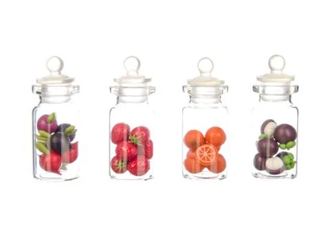 Artificial fruit and vegetable in the bottle isolated Stock Photos