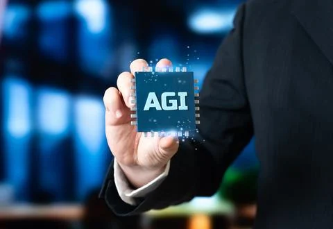 Artificial General Intelligence microchip in the hand of a businessman. A n.. Stock Photos