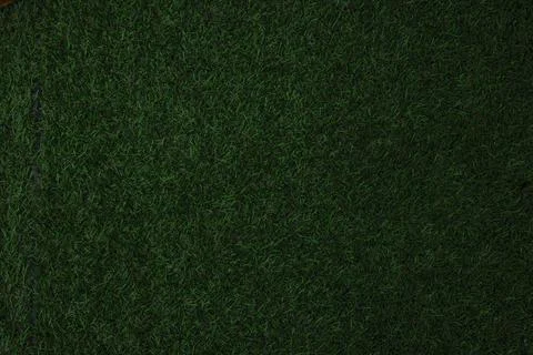 Artificial grass, covering. Artificial green grass mat, top view. Texture. Ba Stock Photos