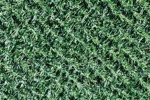 Artificial grass horizontal textured background, imitation of natural grass Stock Photos