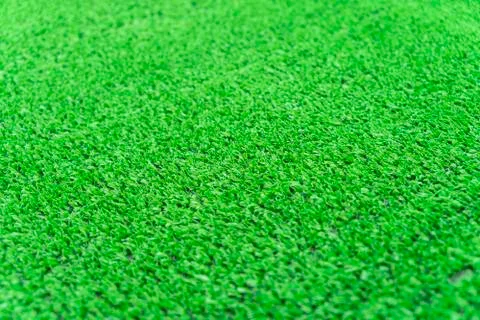 Artificial grass lawn texture. Artificial Turf Background. Greening with an Stock Photos