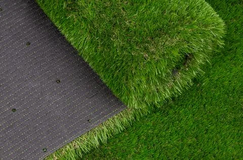Artificial Grass Roll Displaying Backing and Texture Foto stock