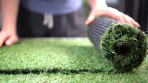 Artificial grass rolling for floor greening Stock Footage 119126579
