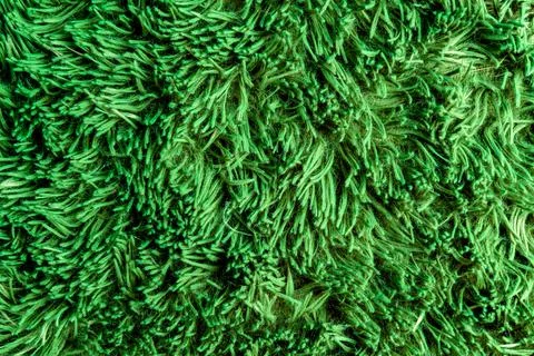 Artificial green grass texture. Background top-view close-up. Gress backgroun Foto stock
