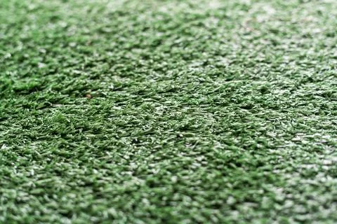Artificial green grass texture background for soccer field, golf course, lawn Stock Photos